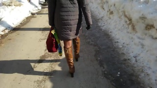 lady in black tights and boots